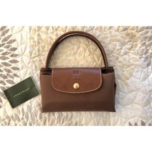 New...Never used..Longchamp Original top handle Small tote. Brown.